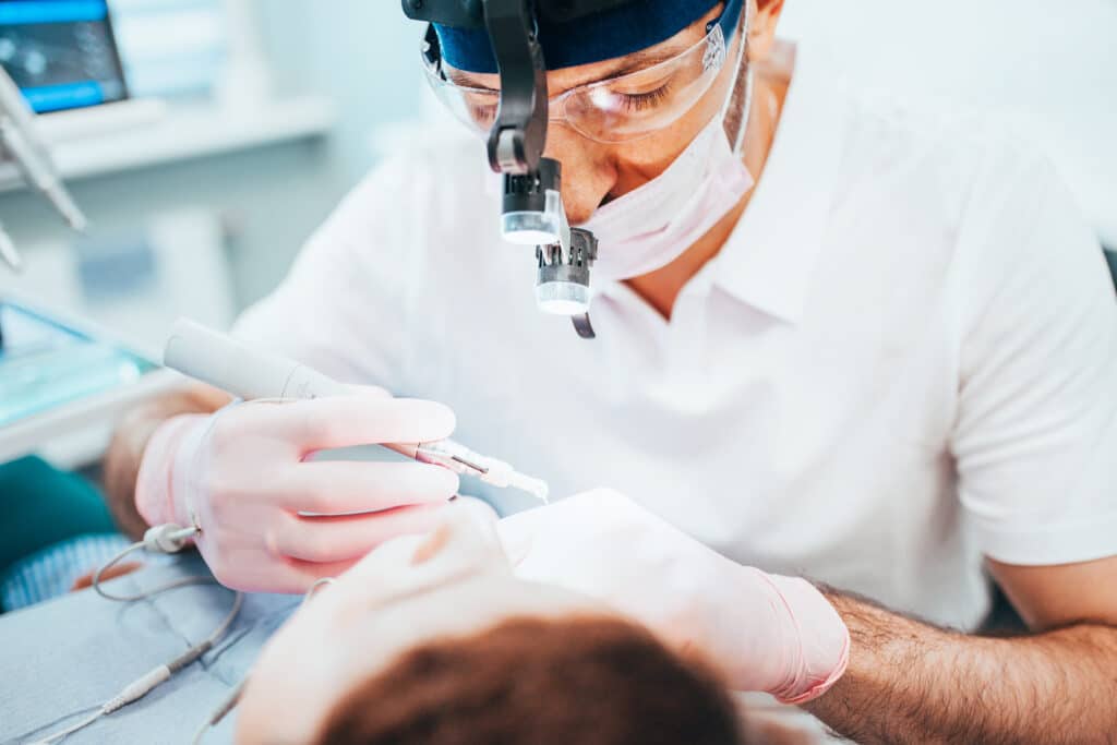 dentist performing a root canal