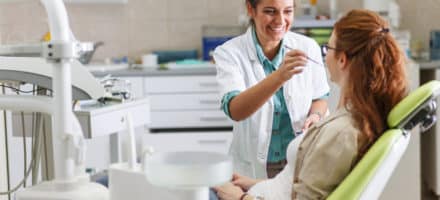 Holistic dentist working on patient
