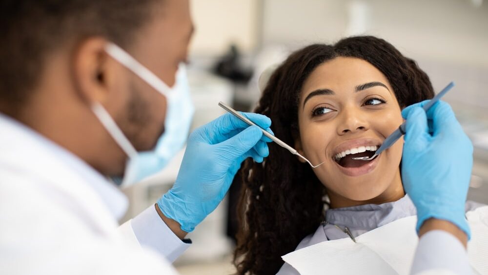 Woman getting a dental check-up in anchorage