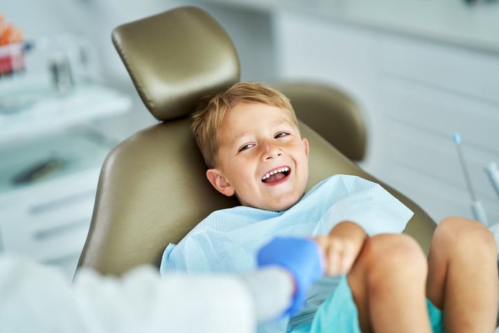 child in a dentist office for health checkup