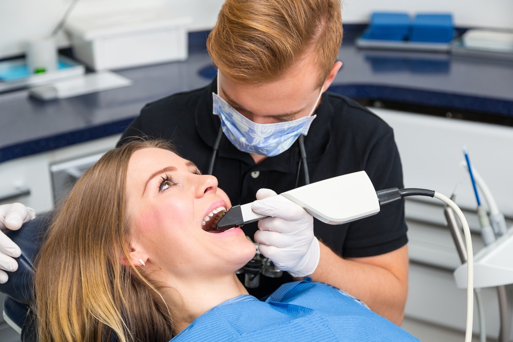 Dentist using the newest dental technology