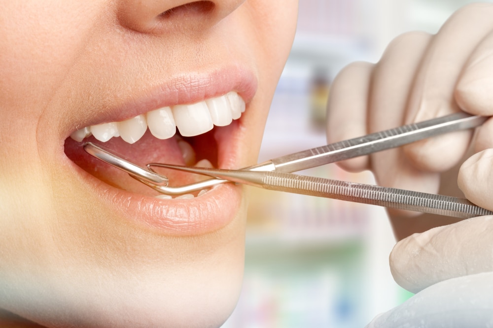 Woman receiving periodontal therapy